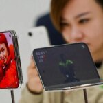 Apple Inc. quickly sold out of its limited in-store inventory for the new iPhone Duo