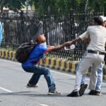 Indian police crack down on ‘Cockroach’ protest in Delhi