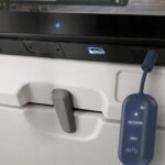 AirFly’s wireless headphone dongle adds a screen to guide you through the pairing process